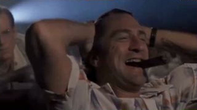 man laughing lying back