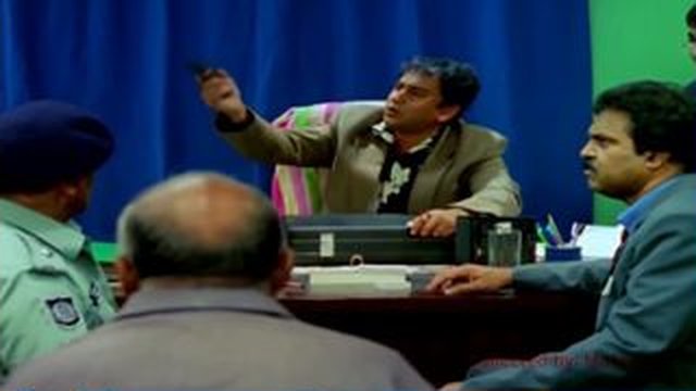 man shouts at desk