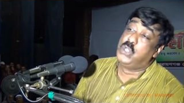 man laughing on mic